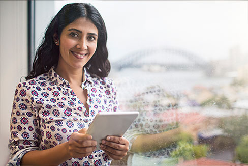 Women smiling at a window
